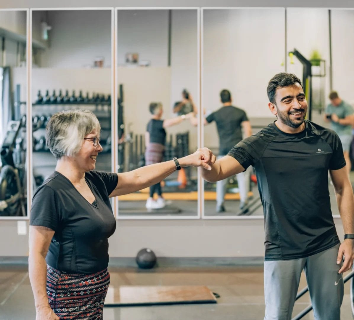 The Crucial Role of Sleep in Recovery: Why Rest Is the Secret Weapon of Progress 2 old woman and man brofist